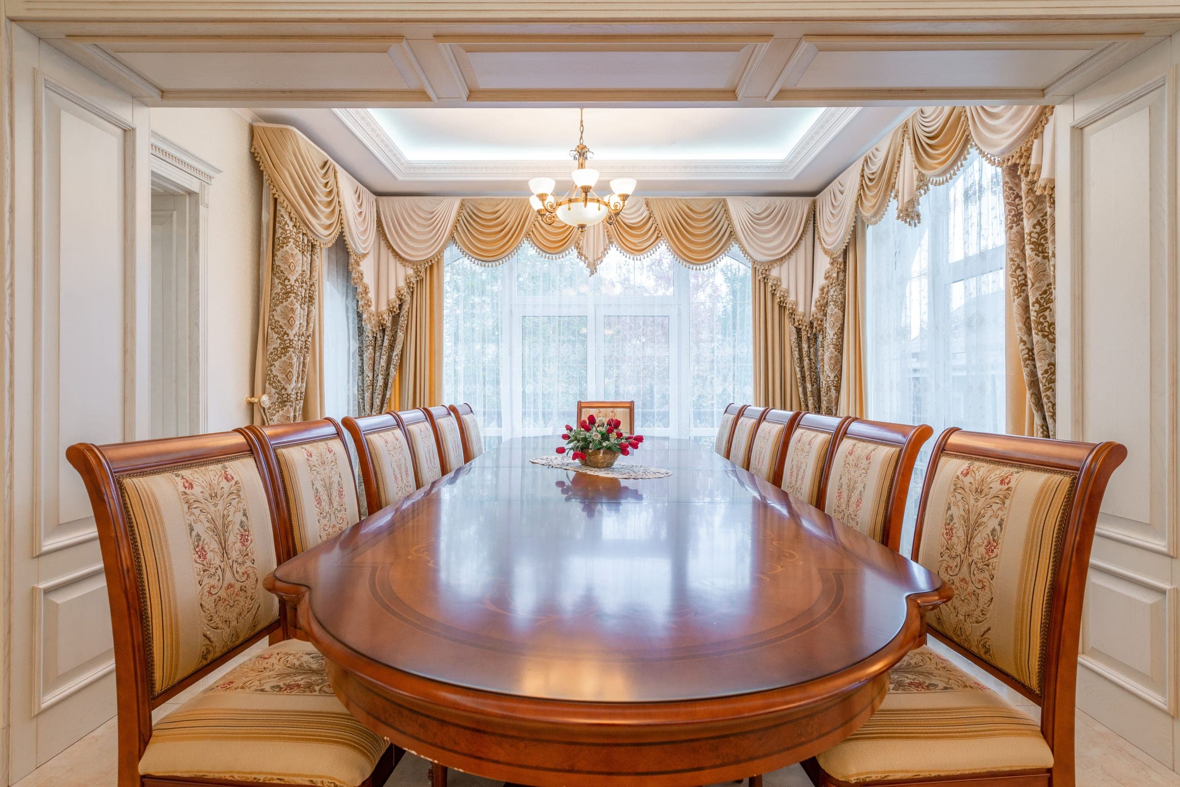 Rajput Dining Chairs arranged around a long table
